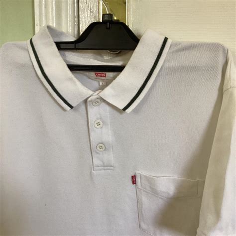 Levi's Men's Cream Polo-shirts | Depop