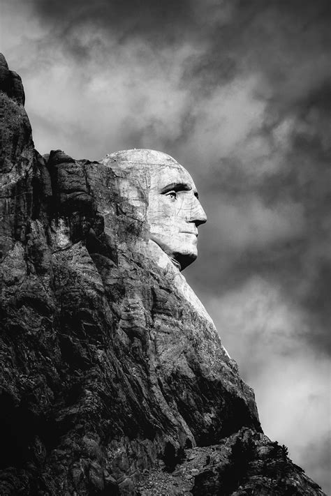 Grayscale Photo of Mans Face Concrete Statue · Free Stock Photo
