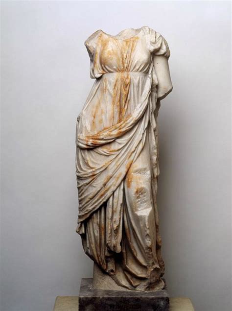 Greek 1st century BCE "Female Statuette" Wears a Hellenistic chiton, sleeveless, showing empire ...