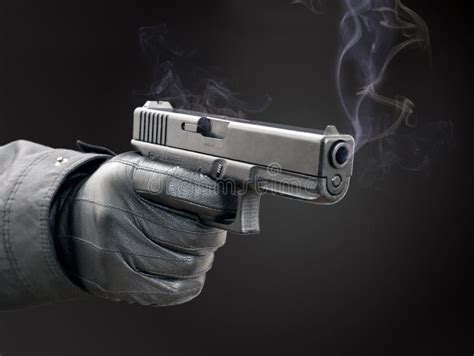 Smoking gun stock image. Image of civilian, hand, defense - 23774351