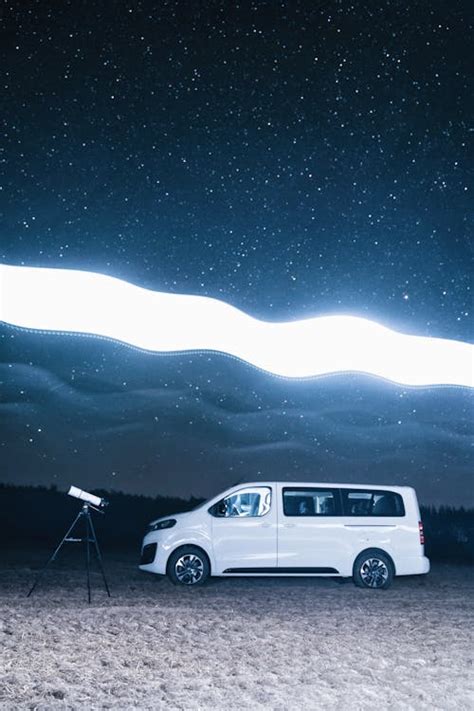 Car against a Starry Night Sky · Free Stock Photo