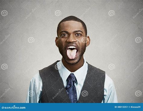 Man Sticking His Tongue Out Stock Image - Image of disgust, company: 48013351