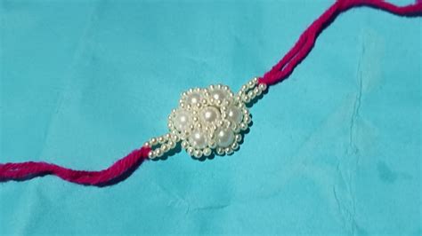 New rakhi design 2023 /simple moti rakhi making ideas at home - YouTube