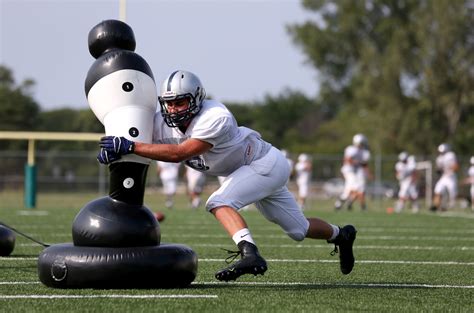 Hawk tackling technique used by New Trier High School football players - Chicago Tribune