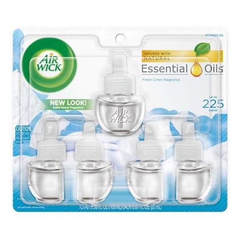 Air Wick 0.67 oz. Fresh Linen Automatic Air Freshener Oil Plug-In ...