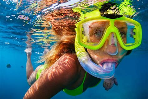 Young Woman Snorkeling with Coral Reef Fishes Stock Photo - Image of girl, happy: 115137472