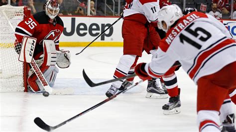 Devils Beat Hurricanes In Hockey Game