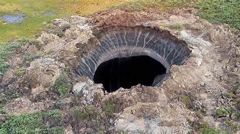 Mysterious sinkhole: Giant 30 meter-wide hole in Russia found by scientists - sinkhole ...