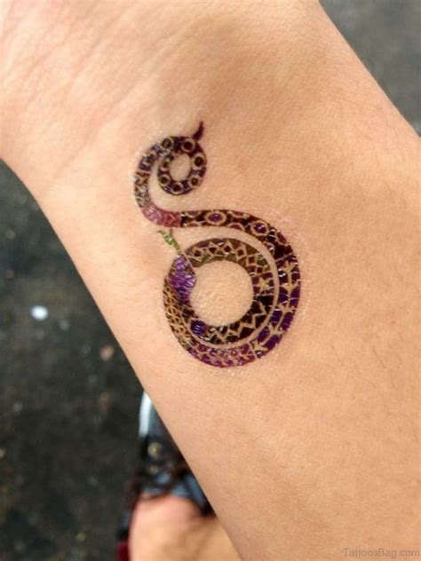 47 Unique Snake Tattoos For Wrist - Tattoo Designs – TattoosBag.com