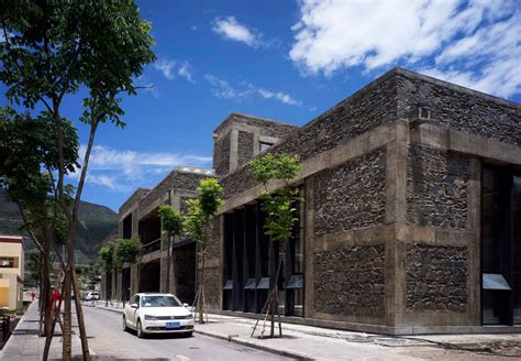 Tibetan school in China is clad is stone to match mountainous setting ...