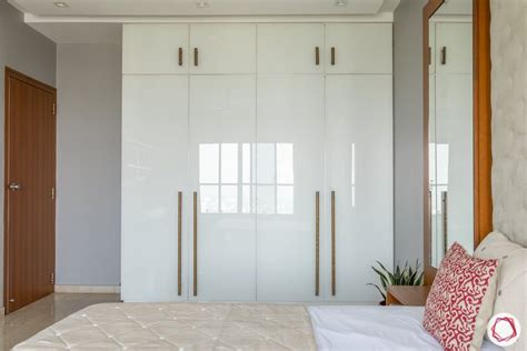 white wardrobe design-glossy hinged door-metallic handles | Wardrobe design bedroom, Wardrobe ...