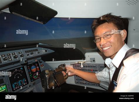 Trainee Pilot in cockpit simulator for commercial passenger jet Stock Photo - Alamy