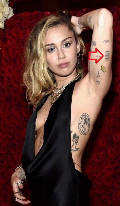 Miley Cyrus Tattoos / Miley Cyrus Tattoo Designs Ideas Their Meanings 2020 By Realfanrinkle ...