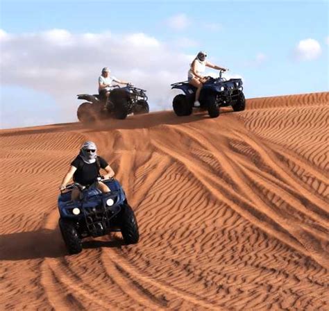 Doha Safari: ATV Ride, Dune Bashing, & Sandboarding Fun | GetYourGuide