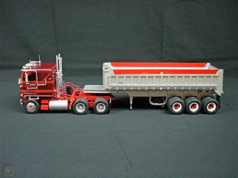 Built 1/25 scale model semi-truck AMT GMC Astro 95 and Ertl Dump Gravel Trailer | #1850218107