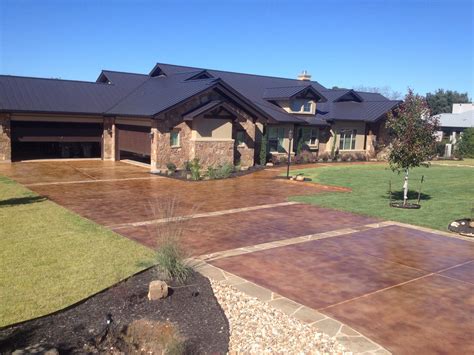 A stand out driveway stained by the pros at Modern Concrete Creations, Austin TX Stained ...