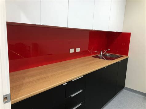 Red #splashbacks in custom #Dulux colour used throughout medical centre. Our custom colour & cut ...