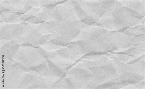 Closeup crumpled grey paper texture background, texture.Gery paper sheet board with space for ...