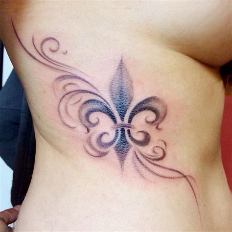 Soft fluerdelys de lys tattoo on side part (With images) | Small tattoos, Inspirational tattoos ...