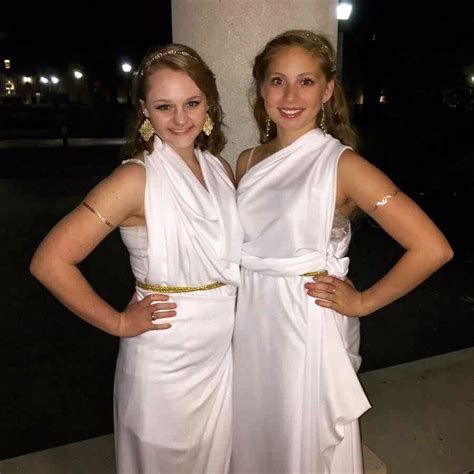 DIY Toga Costume -3 yards of white fabric -2 yards of gold rope(for your waist) -safety pins ...