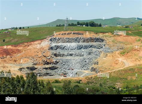 Stone rock quarry open cast mining side of hills rural mountain ...