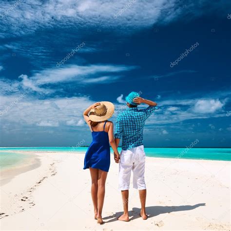 Couple on beach at Maldives Stock Photo by ©haveseen 62359285