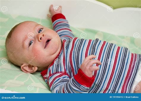 Changing baby stock image. Image of diaper, face, changing - 19199415