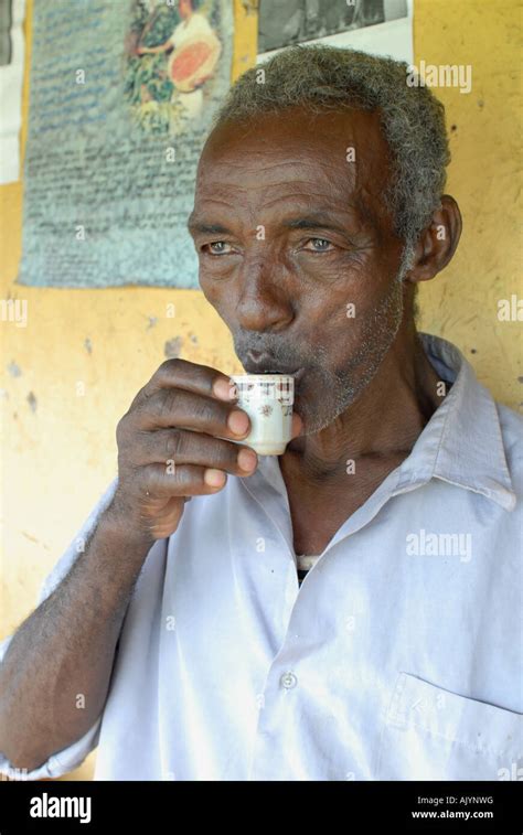 A coffee farmer drinking coffee, Choche, Ethiopia Stock Photo - Alamy