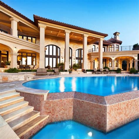 Massive stone mansion with an infinity pool that flows into another infinity pool (7829 Escala ...