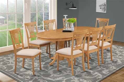 9 PIECE OVAL DINING ROOM TABLE SET w/ 8 SOFT-PADDED CHAIRS IN OAK FINISH - Dining Sets