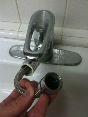 plumbing - Why does my new replacement pull-out kitchen faucet sprayer leak? - Home Improvement ...