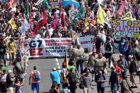 Thousands Join Protest March As World Leaders Arrive In France For G7 - i24NEWS