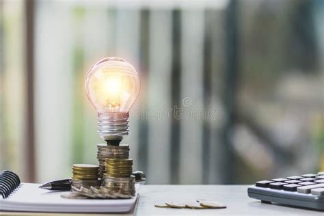 Accounting Concept with Coins, Light Bulb and Calculator on Table Stock Photo - Image of market ...