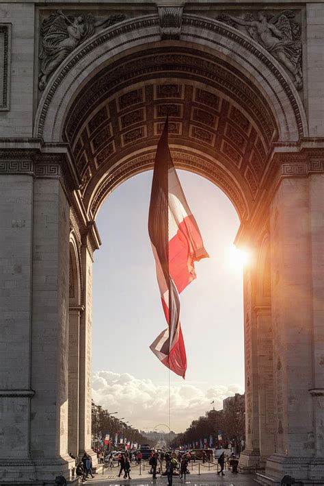 Sunlit View Of French Flag And Arc De Triomphe, Paris, France Digital Art by Walter Zerla