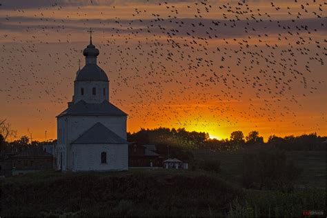 Classic Russian landscape – sunset, church, birds · Russia Travel Blog