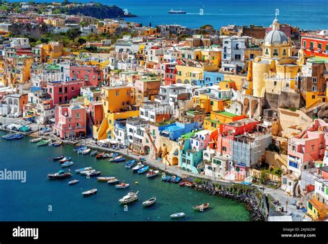 Colorful traditional houses in the Old town port of Procida island ...