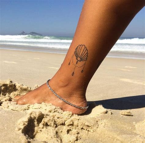 45 Beautiful Seashell Tattoos You'll Love - TattooBlend