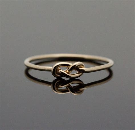 Gold Infinity ring. Solid 14K Gold knot ring. by IndulgentDesigns