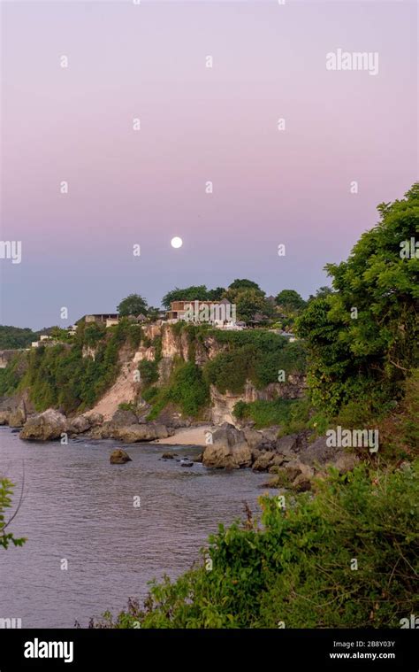 Magical sunset at Balangan beach, Bali in Indonesia Stock Photo - Alamy