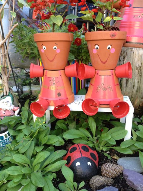 Flowerpot men - Boy and girl and lovely ladybird x Clay Pot Projects, Clay Pot Crafts, Diy Clay ...