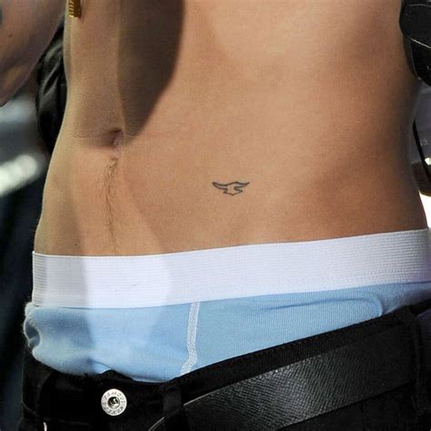 Justin Bieber Tattoo Guide & Meanings - Every Tattoo Explained!