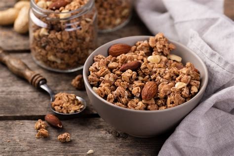 Free Photo | High angle of breakfast cereal in bowl with nuts