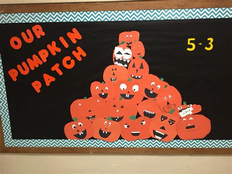 a bulletin board with pumpkins on it that says our pumpkin patch 5 - 3