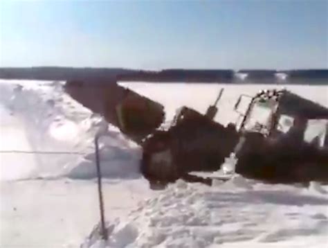 Rescue attempt video of tractor stuck in a deep snow bank