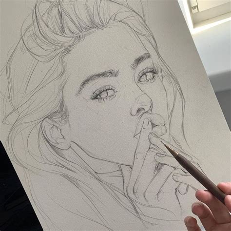 a drawing of a woman holding a pencil in her hand