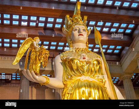 Full scale replica of Athena Parthenos statue holding statue of goddess Nike inside Parthenon in ...