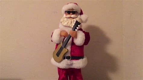 Gemmy Christmas Rockin’ Guitar Santa - YouTube