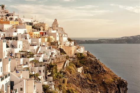 Fira Santorini In The Warm Sunset Light Photograph by Ralucahphotography.ro - Fine Art America