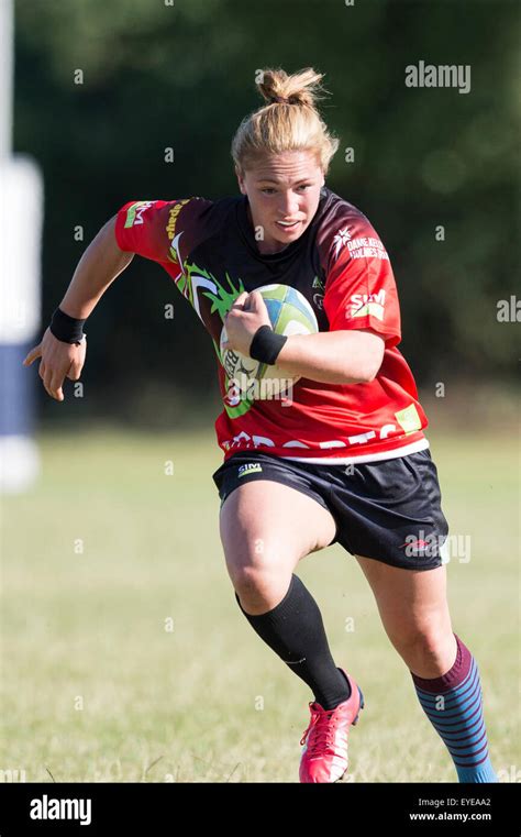 Female rugby players in action Stock Photo - Alamy