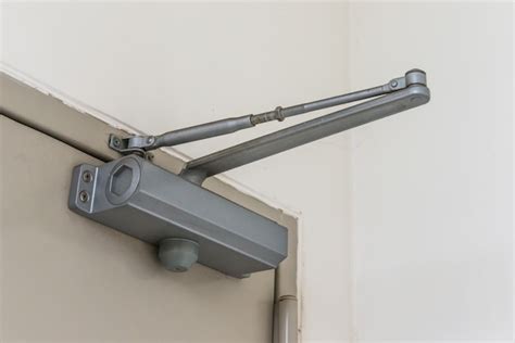 Premium Photo | Automatic hydraulic leaver hinge door closer holder